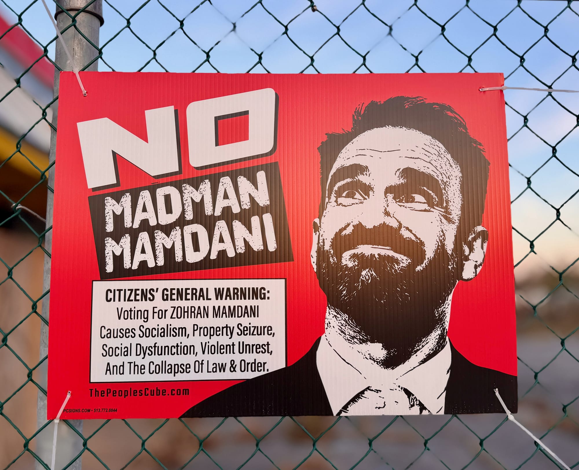 Poster urging voters not to support Mamdani.