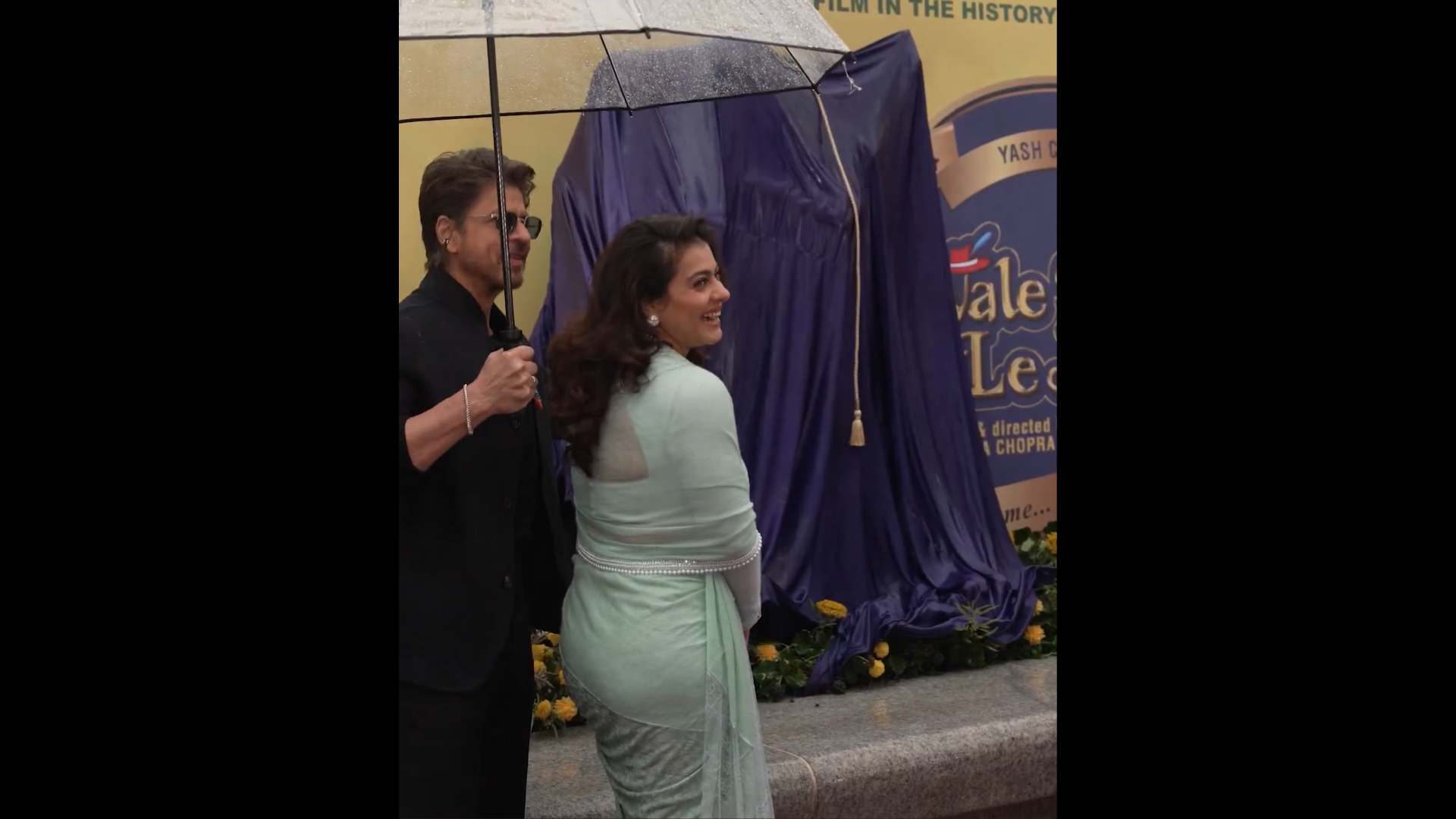 30 Years of DDLJ celebrated by unveiling a statue of Raj and Simran by SRK and Kajol at Leicester Square. Image credit: @iamsrk via X