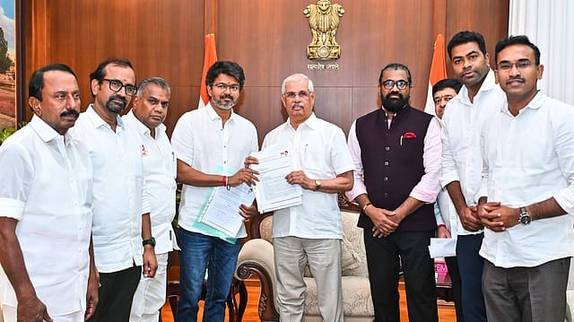 TVK chief Vijay meets Tamil Nadu Governor Rajendra Arlekar to stake claim to form the government at Lok Bhavan, in Chennai on Friday.