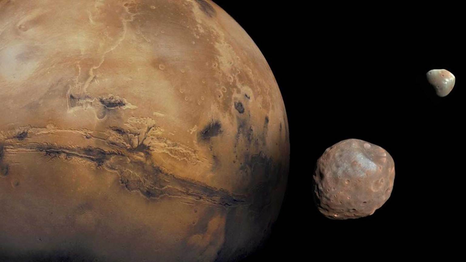 Mars with its two Moons Phobos (nearer to camera) and Deimos (farther).