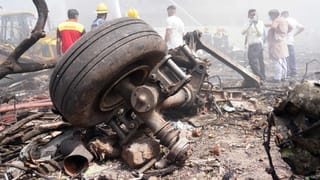 Ruins of a plane lay scattered after a deadly crash