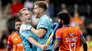 England's Stuart Rushmere and Nicholas Bandurak celebrate the opening goal