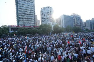 People take part in 'March for Democracy' by INDIA bloc leaders Oct. 12, 2026