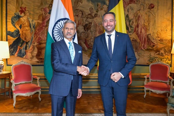 Indian Foreign Minister shaking hands with the Belgian Deputy Prime Minister