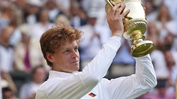 Jannik Sinner with the Wimbledon trophy