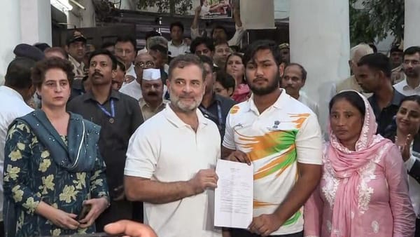 Lok Sabha LoP Rahul Gandhi and Sahil Lochab show the FIR copy 